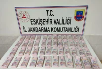 Eskişehir'de sahte parayla büyükbaş hayvan satın aldığı iddia edilen 2 şüpheli yakalandı